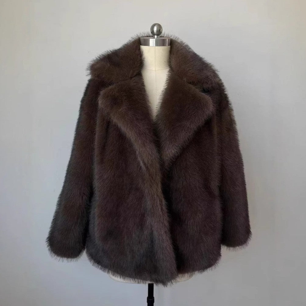 Fluffy Fox Fur Coat Women Loose Elegant Winter displayed on a mannequin with a luxurious design.