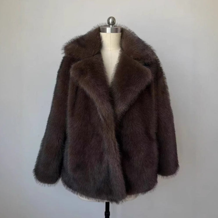Fluffy Fox Fur Coat Women Loose Elegant Winter displayed on a mannequin with a luxurious design.