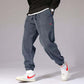 Mens Casual Pants in a stylish design featuring a ribbed texture and paired with trendy sneakers.