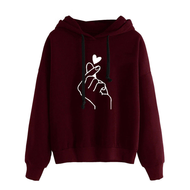 Fleece Hoodie in burgundy color featuring a heart graphic design on the front.