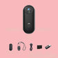 4K Thumb Camera – Ultra Compact with accessories on pink background, featuring lens, charging cable, and remote.